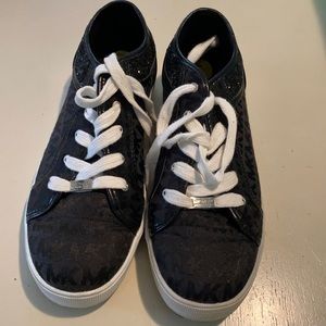 Black Michael Kors kids sneakers with white laces